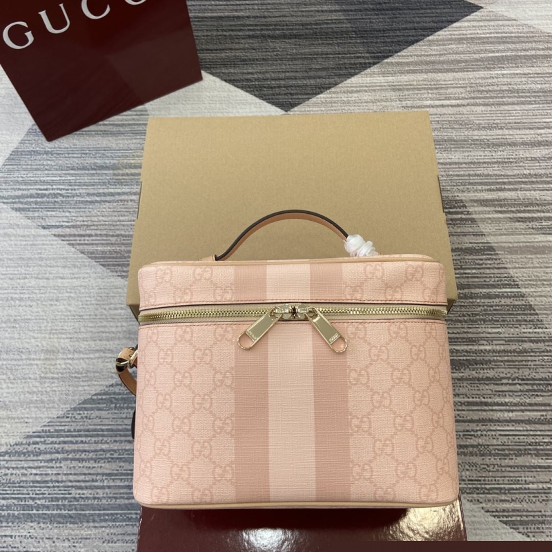 G*u*i cosmetic bags